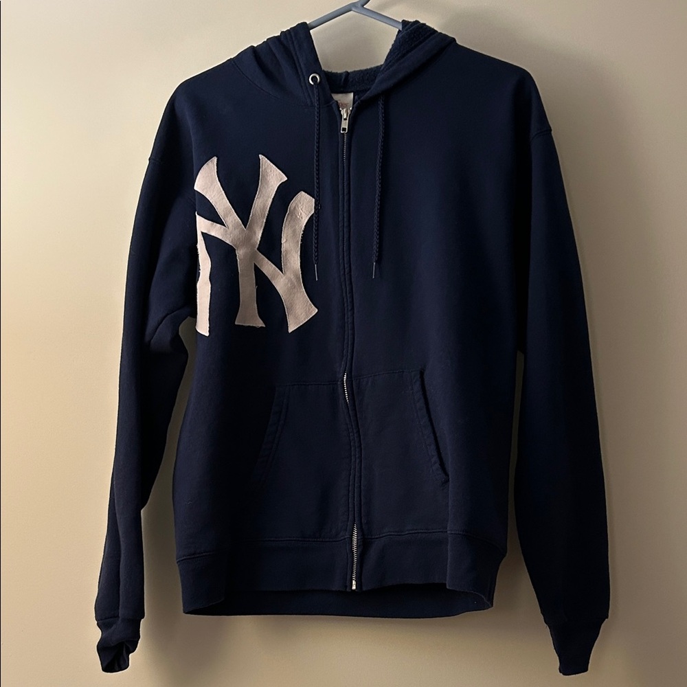 Navy Blue Hoodie with NY Logo. Size medium. Great condition.